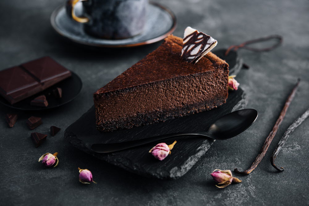 chocolate-cheesecake-on-black-stone-board-2023-03-14-20-43-34-utc.jpg